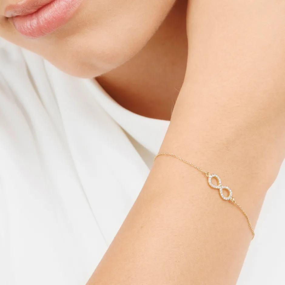 armkette_infinity_mit_dia_3.webp Armkette Infinity mit Diamanten, 18 Karat Gelbgold-LEAF Hot