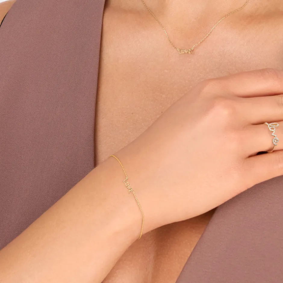 armkette_tiny_love__k_gel_1.webp Armkette TINY LOVE, 18 K Gelbgold vergoldet-LEAF Fashion