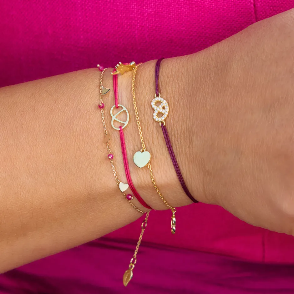 glcksbndchen_brezn_mit_zi_1.webp Glücksbändchen "Brezn" mit Zirkonia, 18 K Gelbgold vergoldet,-LEAF Fashion