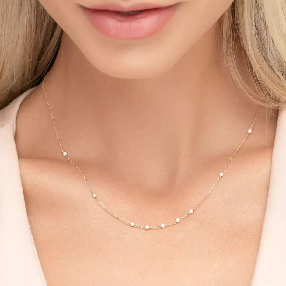 halskette_white_pearls__k_1.webp Halskette White Pearls, 14 Karat Gelbgold-LEAF Fashion
